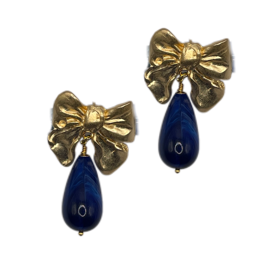 Goldene Schleife mit blauen Tropfen