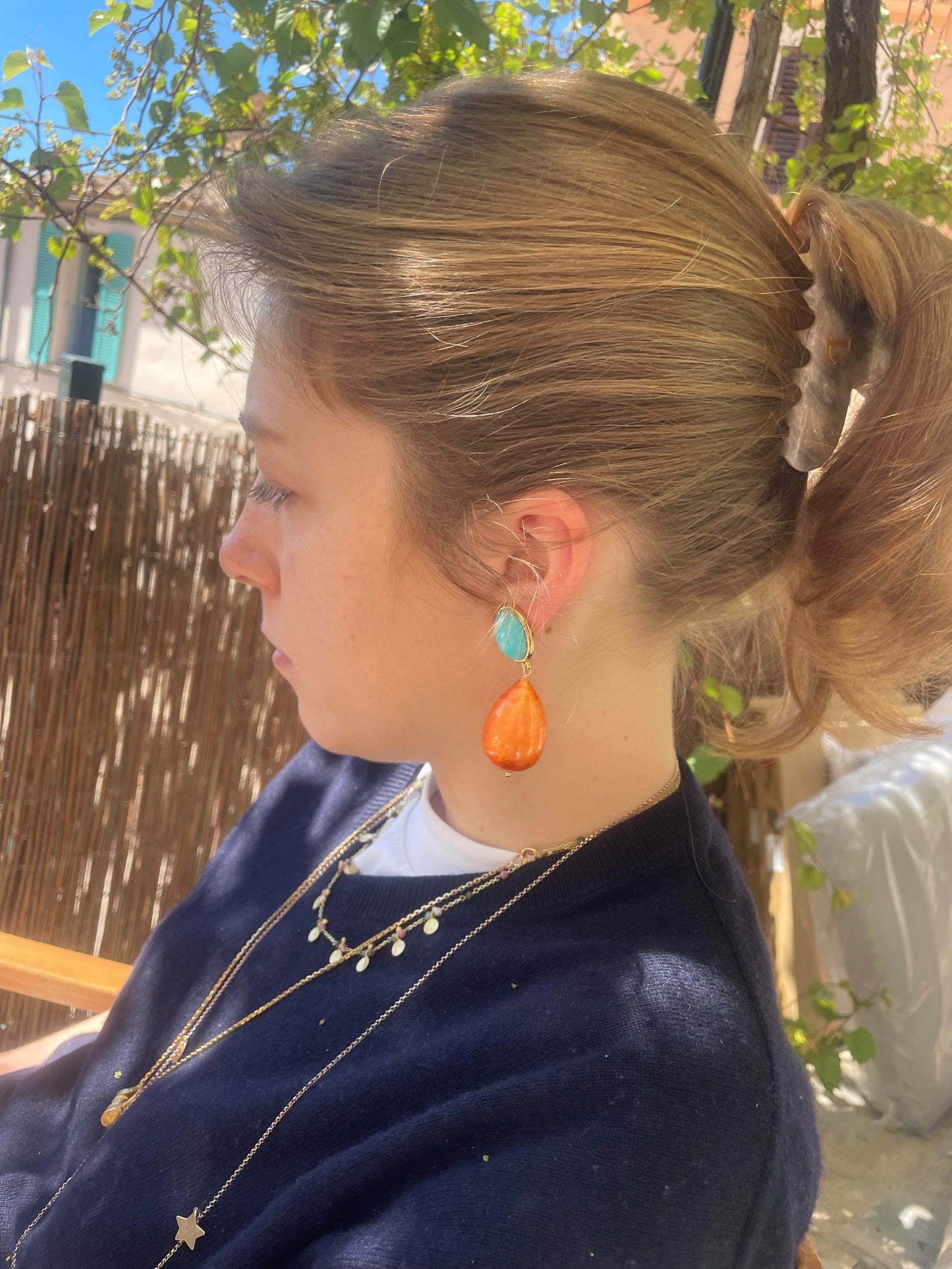 Nuvola Orange mit türkis farbenden Stecker