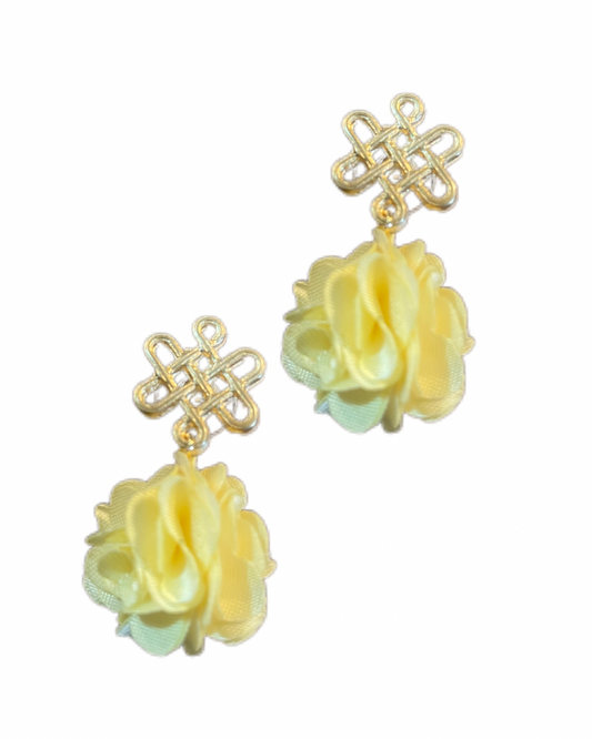 Glücksknoten mit gelben Fleur